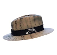 a hat with a pin on it